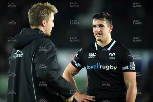 271017 - Ospreys v Dragons Rugby - Guinness PRO14 - Tyler Morgan of Dragons and Owen Watkin of Ospreys at the end of the game