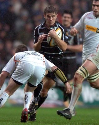 311206 - Ospreys v Newport Gwent Dragons - Magners League - Ospreys Richard Mustoe takes on Ceri Sweeney 