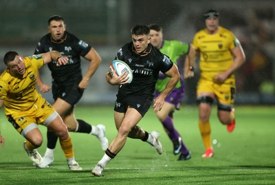 241026 - Ospreys v Dragons - United Rugby Championship - Reuben Morgan-Williams of Ospreys runs in to score a try