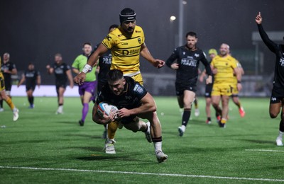 241026 - Ospreys v Dragons - United Rugby Championship - Reuben Morgan-Williams of Ospreys runs in to score a try