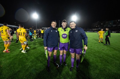 241026 Ospreys v Dragons RFC, BKT United Rugby Championship - Referee Ben Whitehouse with assistants Craig Evans, left, and Ben Breakspear at the end of the match