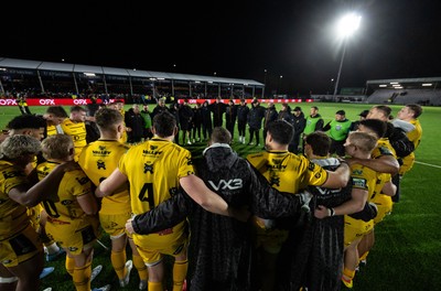 241026 Ospreys v Dragons RFC, BKT United Rugby Championship - The Dragons squad huddle up at the end of the match