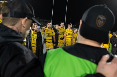 241026 Ospreys v Dragons RFC, BKT United Rugby Championship - The Dragons squad huddle up at the end of the match