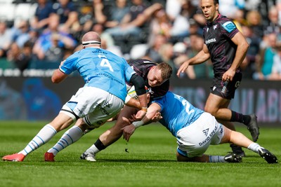260425 - Ospreys v Dragons RFC - United Rugby Championship - Dewi Lake of Ospreys is tackled by Brodie Coghlan of Dragons 