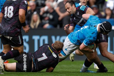 260425 - Ospreys v Dragons RFC - United Rugby Championship - Rhodri Jones of Dragons is tackled by Jac Morgan of Ospreys