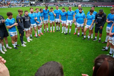 260425 - Ospreys v Dragons RFC - United Rugby Championship - Dragons RFC players huddle at end of game