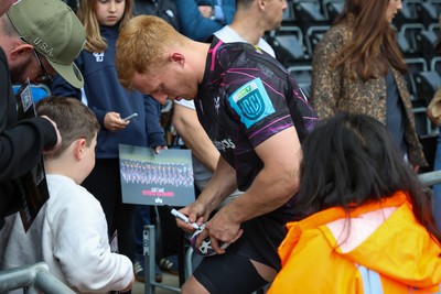 260425 - Ospreys v Dragons RFC - United Rugby Championship - Ospreys players with fans after game