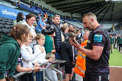 260425 - Ospreys v Dragons RFC - United Rugby Championship - Ospreys players with fans after game