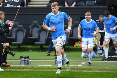 260425 - Ospreys v Dragons RFC - United Rugby Championship - Shane Lewis-Hughes of Dragons runs out at the start of the match