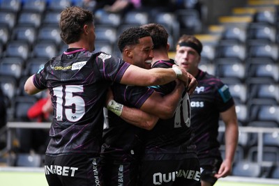 260425 - Ospreys v Dragons RFC - United Rugby Championship - Dan Edwards of Ospreys celebrates scoring a try with team mates