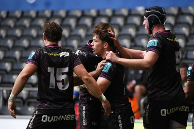 260425 - Ospreys v Dragons RFC - United Rugby Championship - Dan Edwards of Ospreys celebrates scoring a try with team mates