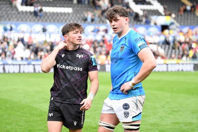260425 - Ospreys v Dragons RFC - United Rugby Championship - Dan Edwards of Ospreys and Ryan Woodman of Dragons at full time