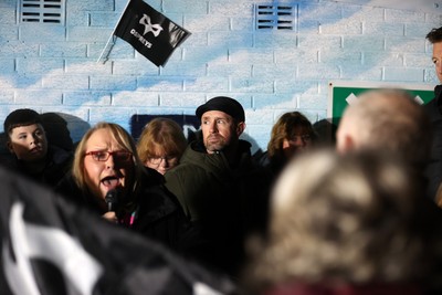310126 - Ospreys v Dragons - United Rugby Championship - Fans protest before the game, Shane Williams speaks to the crowd
