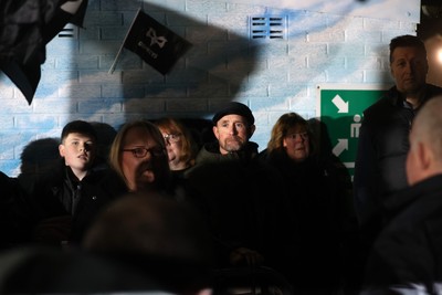 310126 - Ospreys v Dragons - United Rugby Championship - Fans protest before the game, Shane Williams speaks to the crowd