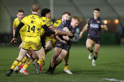 310126 - Ospreys v Dragons - United Rugby Championship - Iestyn Hopkins of Ospreys is tackled by Fine Inisi of Dragons 