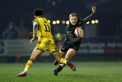 310126 - Ospreys v Dragons - United Rugby Championship - Iestyn Hopkins of Ospreys is tackled by Rio Dyer of Dragons 