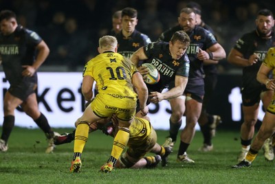 310126 - Ospreys v Dragons - United Rugby Championship - Keiran Williams of Ospreys is tackled by Rio Dyer of Dragons 