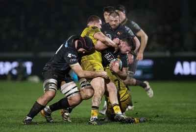 310126 - Ospreys v Dragons - United Rugby Championship - James Ratti of Ospreys is tackled by Brodie Coghlan of Dragons 