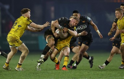 310126 - Ospreys v Dragons - United Rugby Championship - Ross Moriarty of Ospreys is tackled by Tinus de Beer of Dragons 