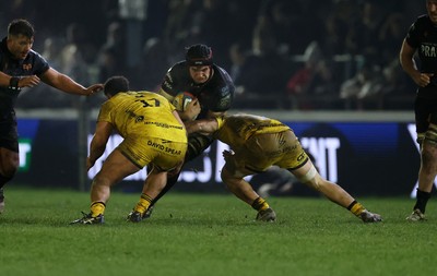 310126 - Ospreys v Dragons - United Rugby Championship - James Fender of Ospreys is tackled by Jordan Morris of Dragons 
