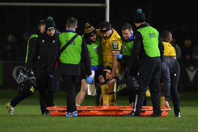 310126 - Ospreys v Dragons RFC - United Rugby Championship - Rob Hunt of Dragons goes off the field injured