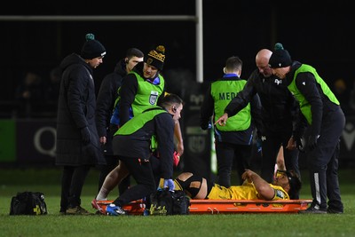 310126 - Ospreys v Dragons RFC - United Rugby Championship - Rob Hunt of Dragons goes off the field injured