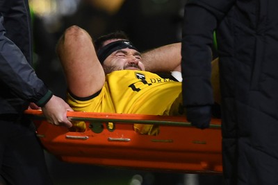 310126 - Ospreys v Dragons RFC - United Rugby Championship - Rob Hunt of Dragons goes off the field injured