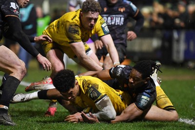 310126 - Ospreys v Dragons RFC - United Rugby Championship - Rio Dyer of Dragons goes close to putting the ball over the line for a try but is stopped by Dan Kasende of Ospreys