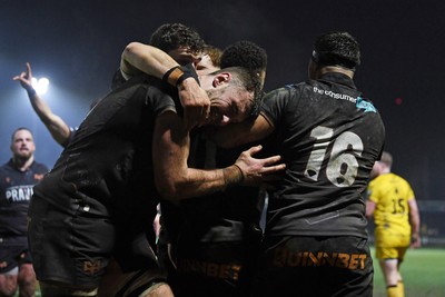 310126 - Ospreys v Dragons RFC - United Rugby Championship - Keelan Giles of Ospreys celebrates scoring a try with team mates