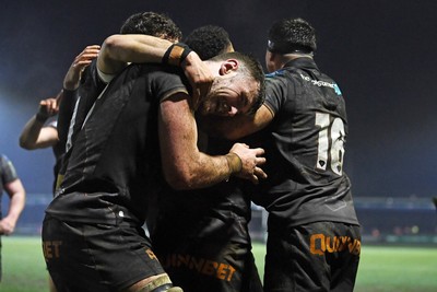 310126 - Ospreys v Dragons RFC - United Rugby Championship - Keelan Giles of Ospreys celebrates scoring a try with team mates
