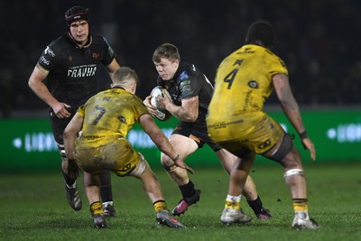 310126 - Ospreys v Dragons RFC - United Rugby Championship - Kieron Williams of Ospreys is challenged by Harry Beddall of Dragons