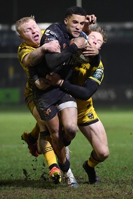 310126 - Ospreys v Dragons RFC - United Rugby Championship - Keelan Giles of Ospreys is challenged by Tinus De Beer of Dragons