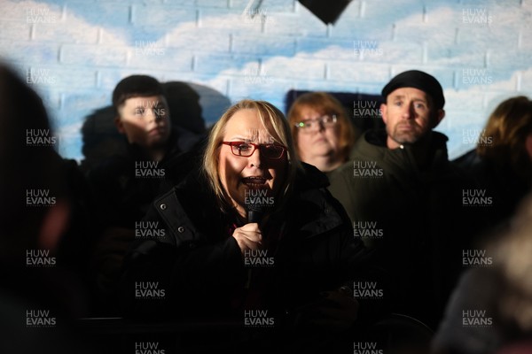 310126 - Ospreys v Dragons - United Rugby Championship - Fans protest before the game, Shane Williams speaks to the crowd