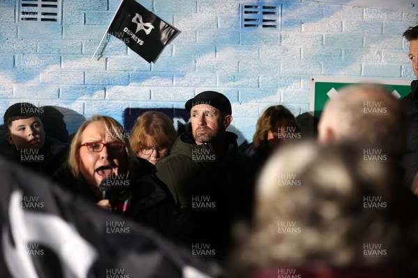 310126 - Ospreys v Dragons - United Rugby Championship - Fans protest before the game, Shane Williams speaks to the crowd