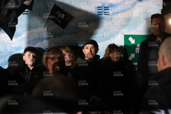 310126 - Ospreys v Dragons - United Rugby Championship - Fans protest before the game, Shane Williams speaks to the crowd