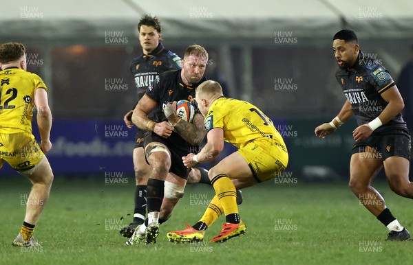310126 - Ospreys v Dragons - United Rugby Championship - Ross Moriarty of Ospreys is tackled by Tinus de Beer of Dragons 