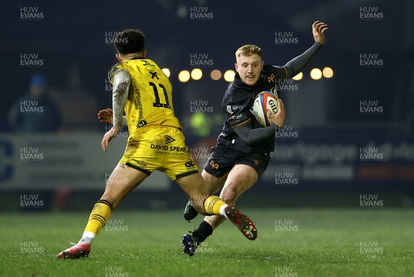 310126 - Ospreys v Dragons - United Rugby Championship - Iestyn Hopkins of Ospreys is tackled by Rio Dyer of Dragons 