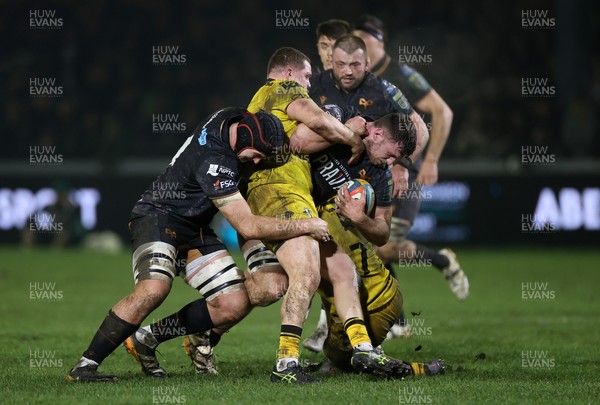 310126 - Ospreys v Dragons - United Rugby Championship - James Ratti of Ospreys is tackled by Brodie Coghlan of Dragons 
