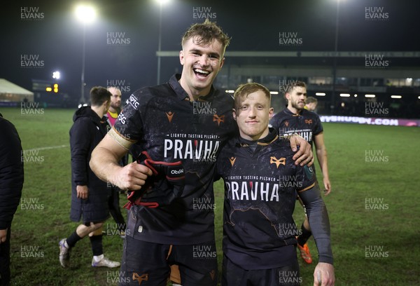 310126 - Ospreys v Dragons - United Rugby Championship - James Fender and Iestyn Hopkins of Ospreys celebrate at full time