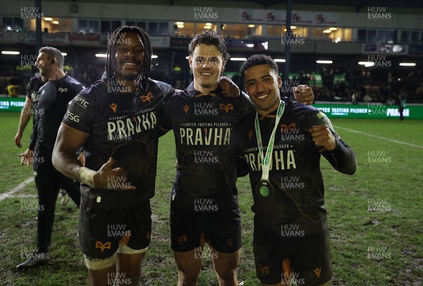 310126 - Ospreys v Dragons - United Rugby Championship - Dan Kasende, Jack Walsh and Keelan Giles of Ospreys celebrate at full time