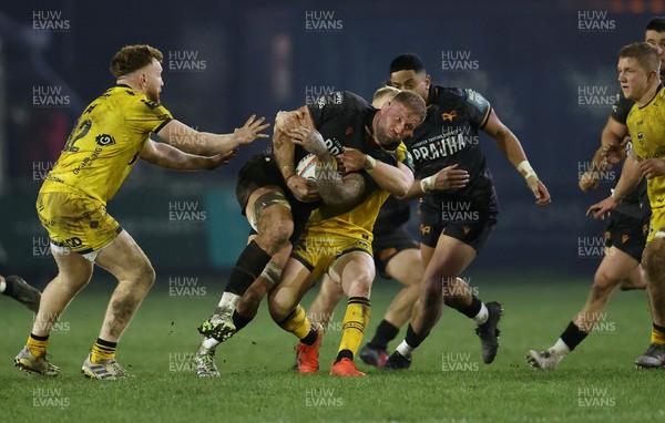 310126 - Ospreys v Dragons - United Rugby Championship - Ross Moriarty of Ospreys is tackled by Tinus de Beer of Dragons 