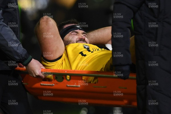 310126 - Ospreys v Dragons RFC - United Rugby Championship - Rob Hunt of Dragons goes off the field injured