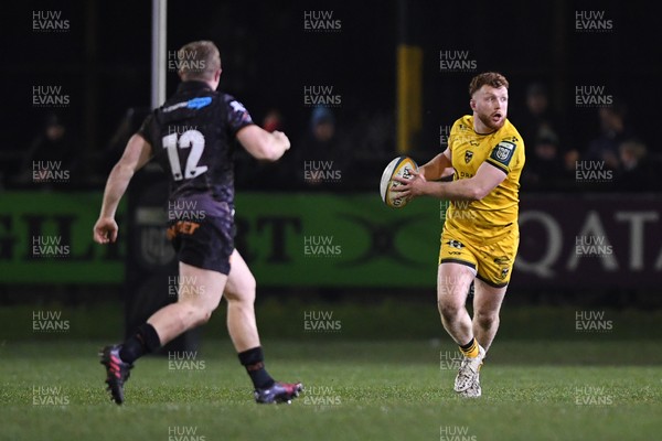310126 - Ospreys v Dragons RFC - United Rugby Championship - Aneurin Owen of Dragons is challenged by Keiran Williams of Ospreys