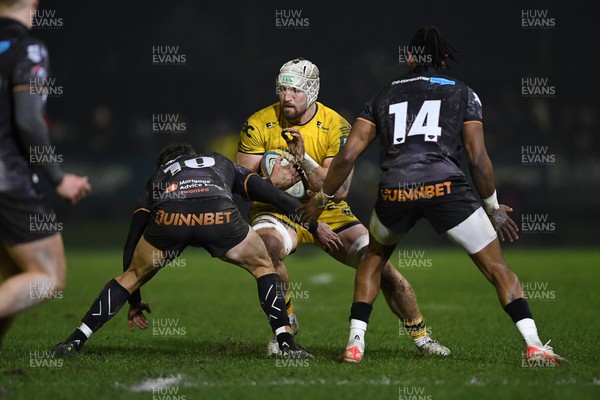 310126 - Ospreys v Dragons RFC - United Rugby Championship - Harri Keddie of Dragons is challenged by Jack Walsh of Ospreys