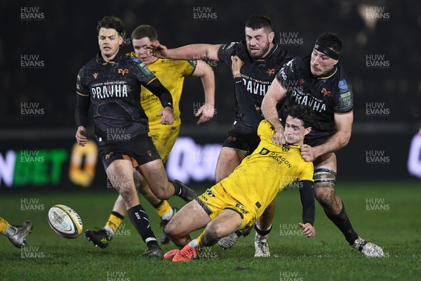 310126 - Ospreys v Dragons RFC - United Rugby Championship - Ryan Smith of Ospreys pulls down Che Hope of Dragons
