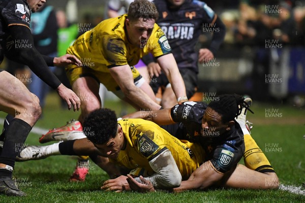 310126 - Ospreys v Dragons RFC - United Rugby Championship - Rio Dyer of Dragons goes close to putting the ball over the line for a try but is stopped by Dan Kasende of Ospreys