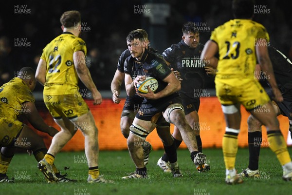 310126 - Ospreys v Dragons RFC - United Rugby Championship - James Ratti of Ospreys is challenged by Aneurin Owen of Dragons