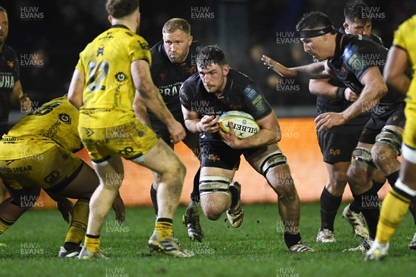 310126 - Ospreys v Dragons RFC - United Rugby Championship - James Ratti of Ospreys is challenged by Aneurin Owen of Dragons