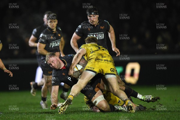 310126 - Ospreys v Dragons RFC - United Rugby Championship - Ross Moriarty of Ospreys is challenged by Aneurin Owen of Dragons