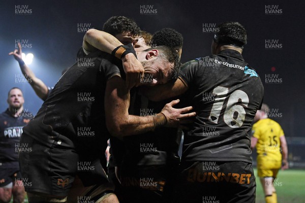 310126 - Ospreys v Dragons RFC - United Rugby Championship - Keelan Giles of Ospreys celebrates scoring a try with team mates